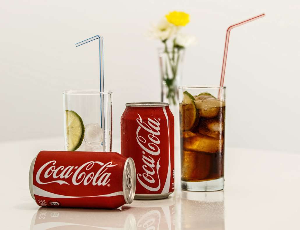 CPG Marketing Terminology - Coca Cola Cans and Glasses Beverage