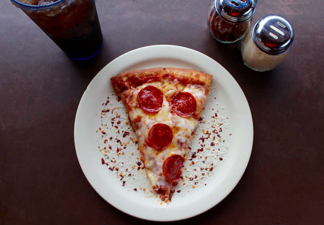 A slice of pizza on national pie day