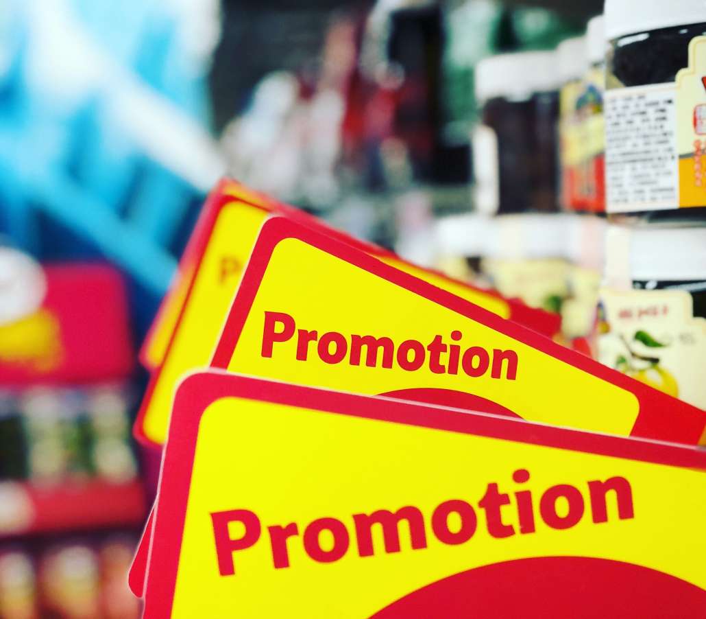 CPG Marketing Terminology - Close Up of Store Sign with Promotion